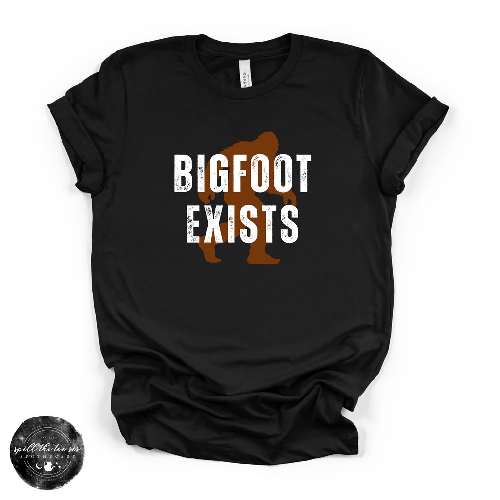 Bigfoot Exists Tee | Funny Cryptid Graphic T-Shirt (WHITE DESIGN)