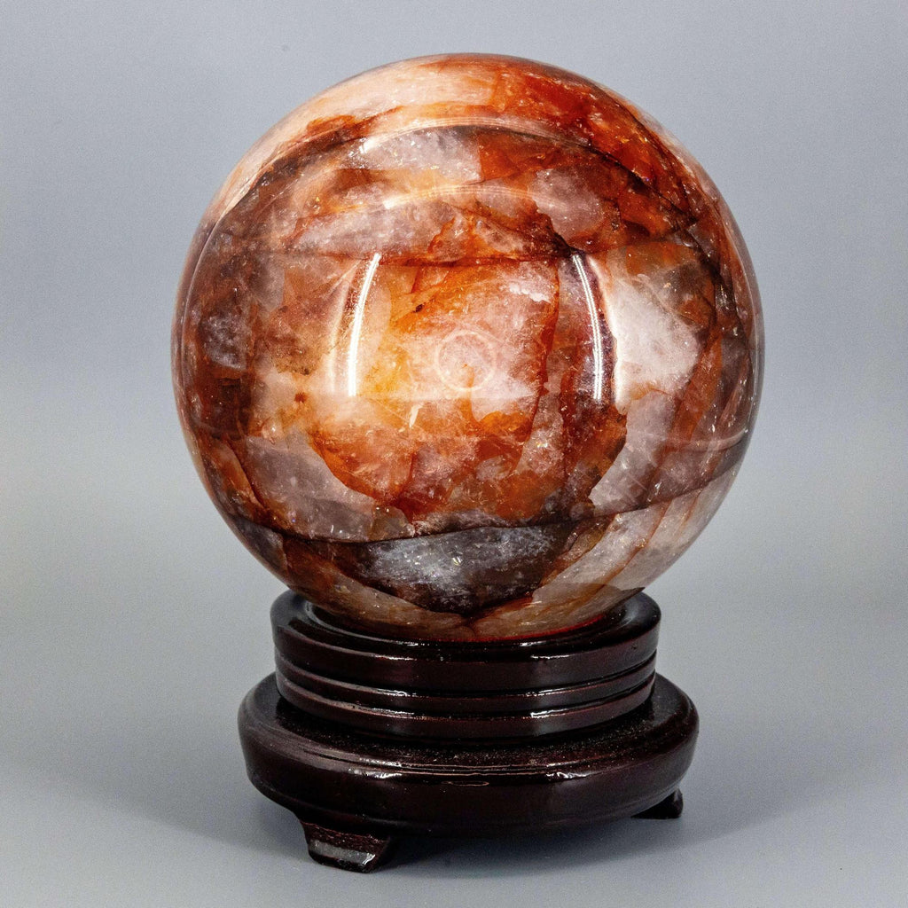 Hematoid Fire Quartz Crystal Sphere with Display Stand